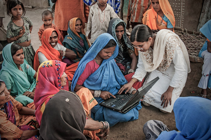/media/sadana/Indian-village-women-learning-to-use-a-laptop-1.jpg
